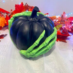 Halloween 8x10 resin black pumpkin with green skeleton hands